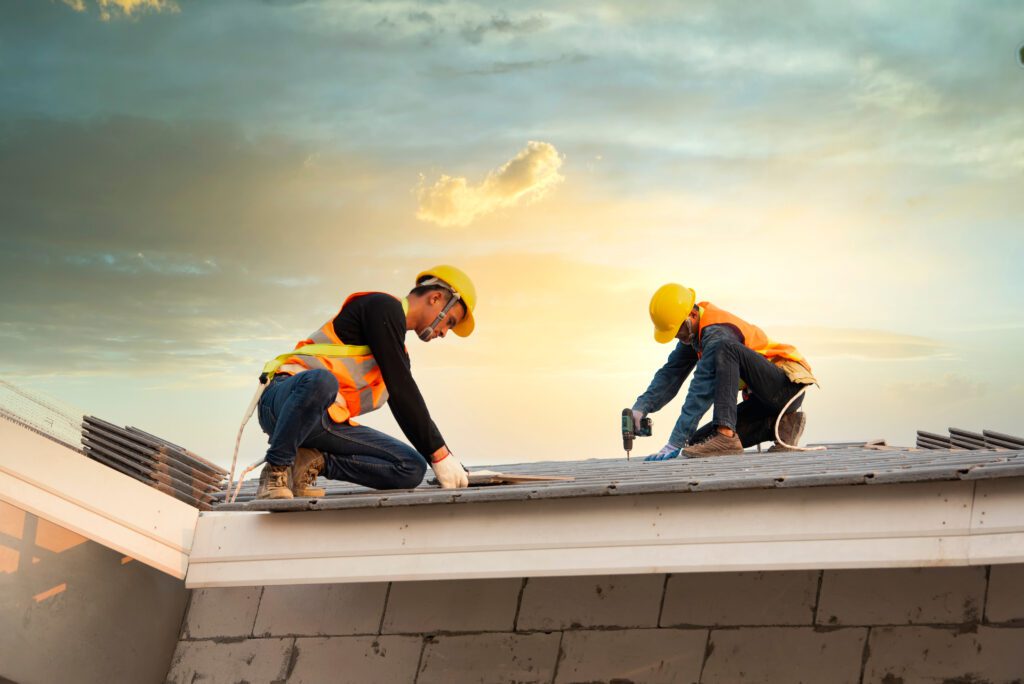 engineer workers install new CPAC roof, roofing tools, electric drill, use on new roof with CPAC roof house construction idea.